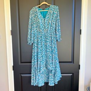 2X green floral high low prairie style dress with gathered waist and cuffs.